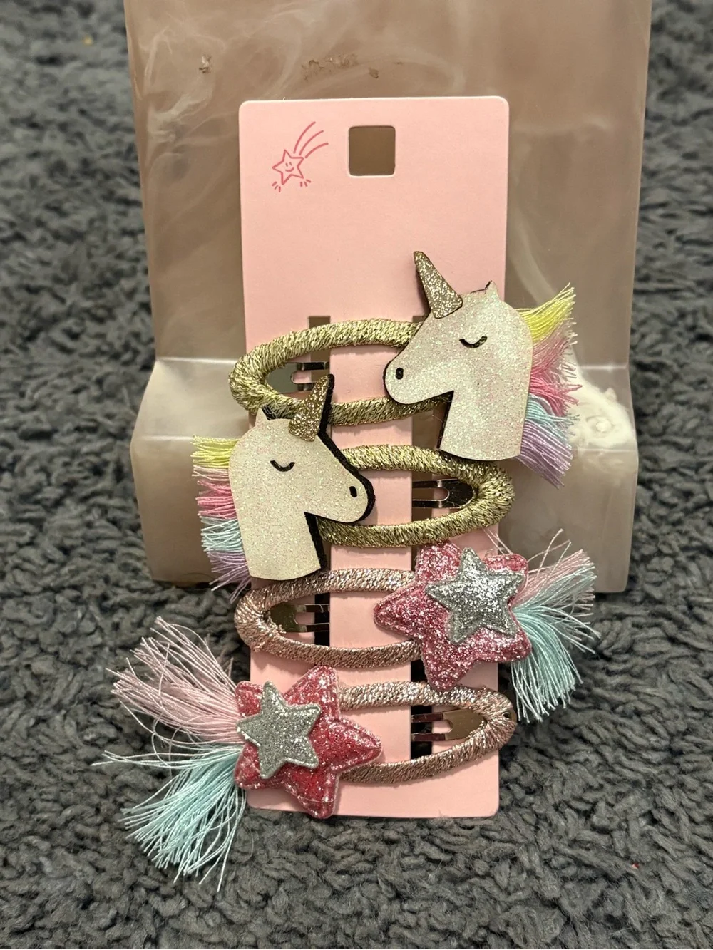 NWT set of 4 hair clips - 2 unicorns, and 2 shooting stars